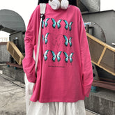 Camisa holgada de manga larga con estampado de mariposas azules